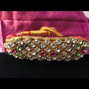 Multi stone bracelet in gold thread